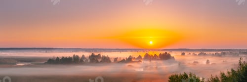 Preview: Amazing Sunrise Sunset Over Misty Landscape. Scenic View Of Foggy Morning Sky With Rising Sun Above