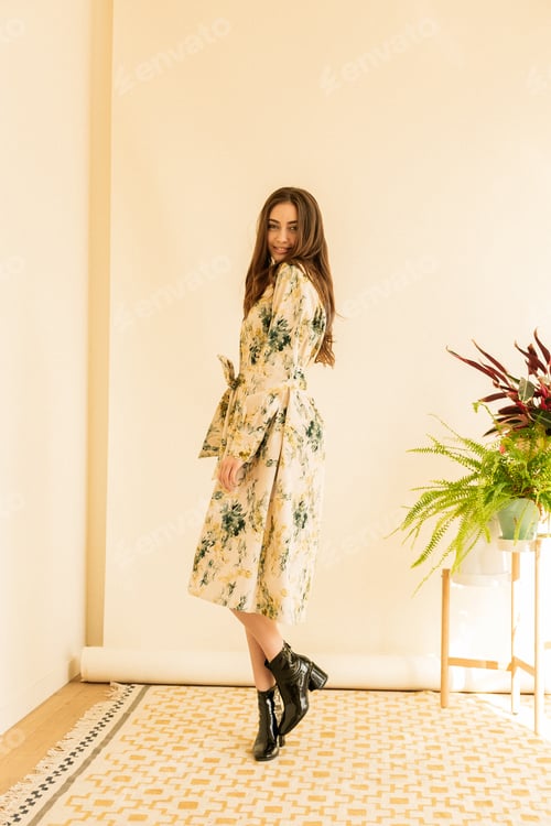 Preview: Beautiful young elegant woman brunette in long dress high heels. Date or party