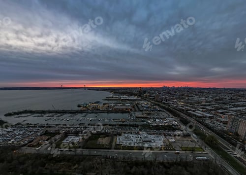 Preview: Aerial view over the industrial area on the shores of Gravesend Bay, at sunset in Brooklyn, New York