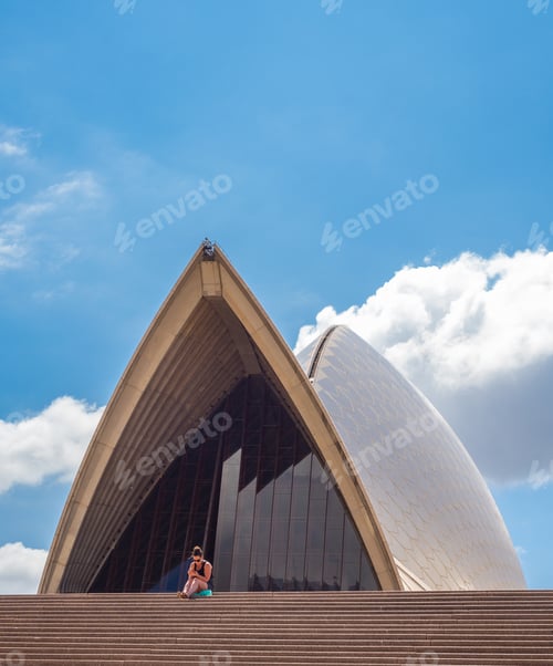 Preview: Sydney, Australia - March, 04 2015: Female resting near Sydney Opera House