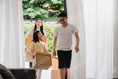 Preview: Happy Asian young family bought new house.