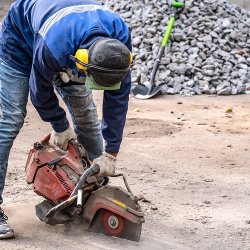 Preview: Cutting Concrete Floor For Cable Laying Using Diamond Cutting. Construction Worker In Safety