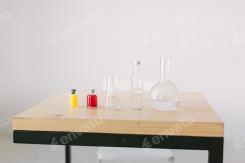 Preview: Table with reagent flasks on white background