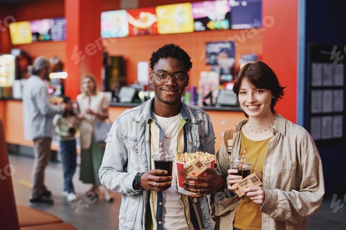 Preview: Young Couple With Tickets For Movie