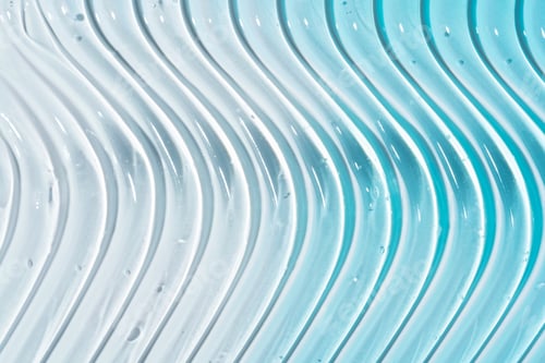 Preview: Liquid gel abstract cosmetic wavy background. Smear of transparent moisturizing product