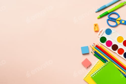 Preview: School supplies on colored background.