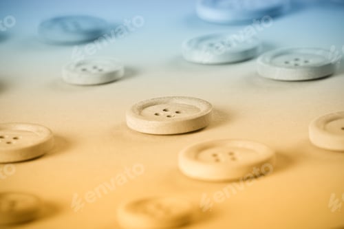 Preview: Wooden Buttons Lie On A White Background