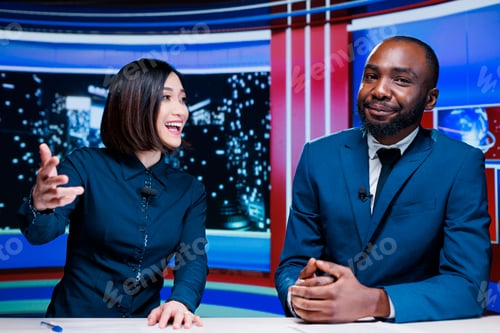 Preview: TV show hosts presenting breaking news