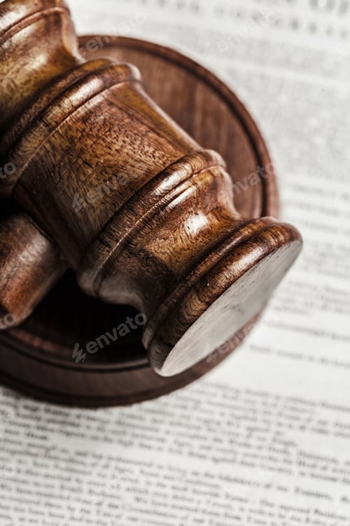 Preview: American Declaration of Independence and wooden gavel.