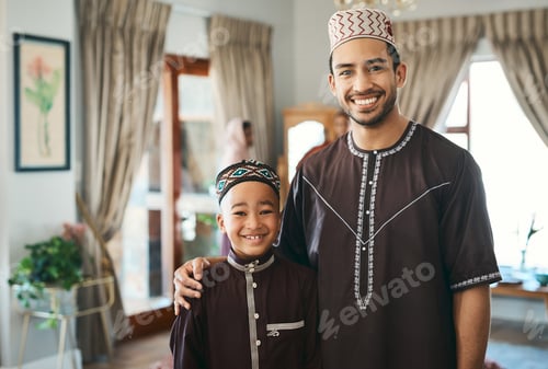 Preview: Im so proud to be your father. Shot of a muslim father embracing his son.