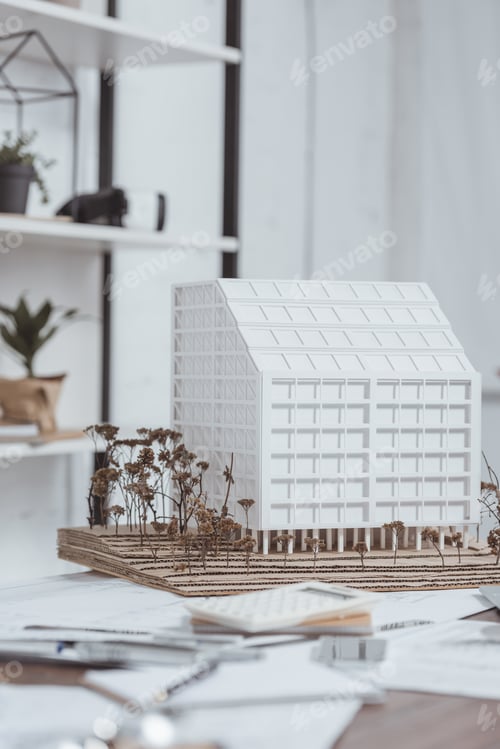 Preview: close up view of building model at workplace in office