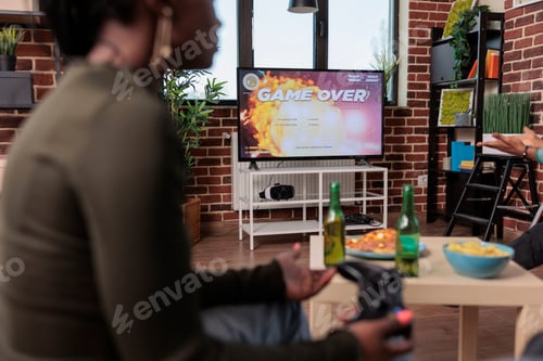 Preview: African american woman losing video games competition