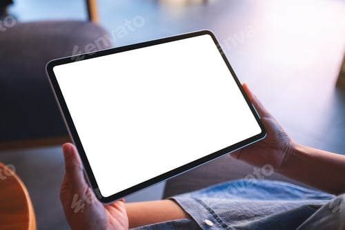 Preview: Mockup image of a woman holding digital tablet with blank white desktop screen in cafe