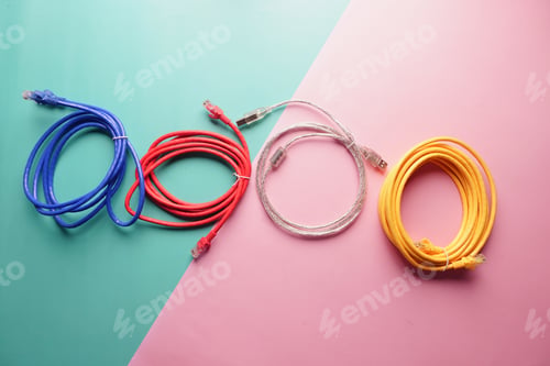 Preview: Colorful network and charging cables arranged on a pastel background