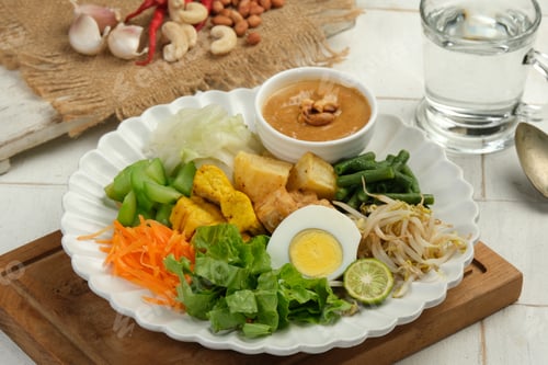 Preview: Gado Gado Indonesian Mix vegetables Salad from Boiled or Steam Vegetable Served with Peanut Sauce.