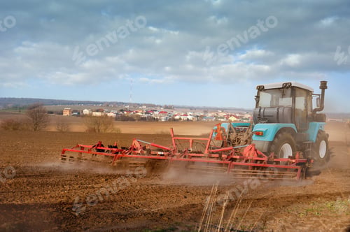 Preview: tractor with harrow prepare the plowded land