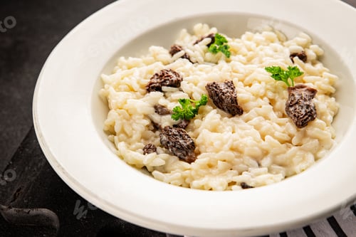 Preview: Risotto with morels rice and mushrooms food main course tasty snack fresh gourmet food