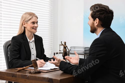 Preview: Man having meeting with lawyer in office