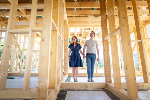 Preview: Loving couple at construction site of their new home dreams come true