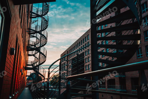 Preview: Spiral staircases in the old Warehouse District. Narrow canal and red brick buildings of