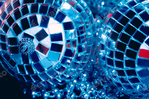 Preview: Mirror balls reflecting lights close up, nightlife background