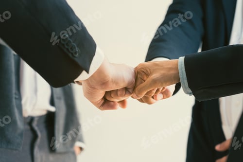 Preview: Teamwork, team building, responsibility and equal opportunities. Hand holding together bumping