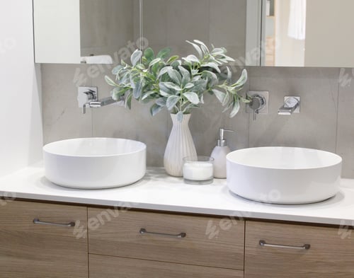 Preview: Twin circular hand washing basins in the bathroom vanity