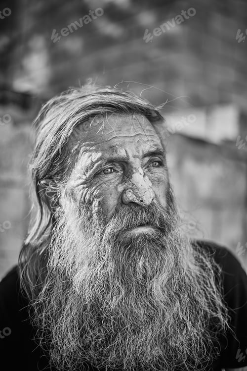 Preview: Close-up shot of an old homeless man's face