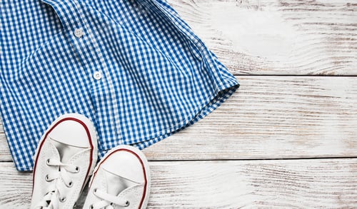 Preview: Casual Plaid Shirt and Sneakers on Wood Surface