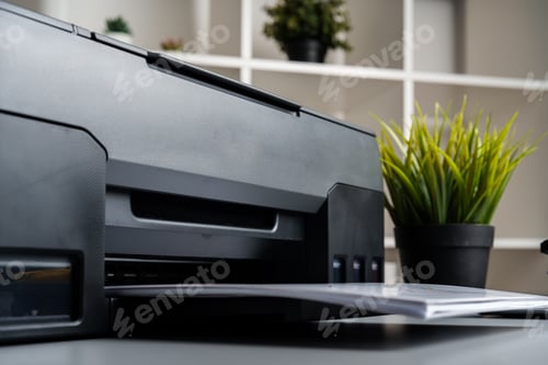 Preview: Close up of modern printer in the office