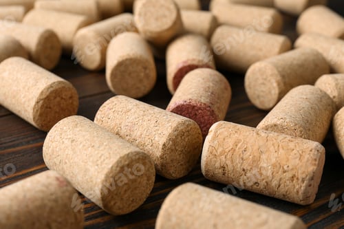 Preview: Many corks of wine bottles on wooden table, closeup