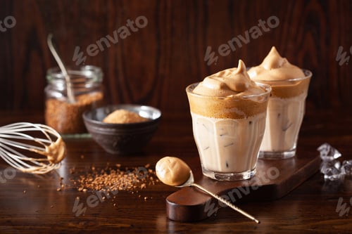 Preview: dalgona coffee in glass. trendy Instant coffee whipped with sugar and hot water