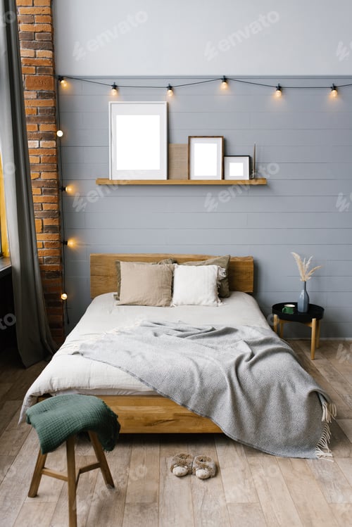 Preview: Double bed with natural natural accents on the sheets and beige pillows in the grey Scandinavian bed