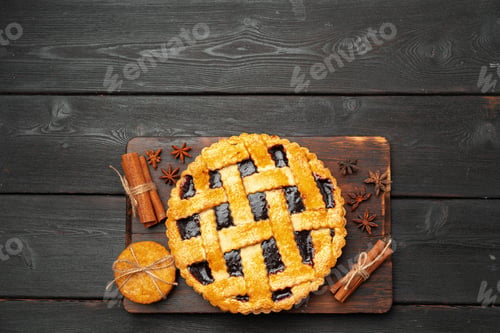 Preview: Close up of homemade traditional sweet autumn raspberry tart pie on wooden table