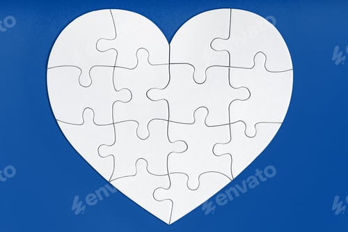 Preview: Jigsaw puzzle pieces in form of heart on blue background. Love, charity, donation, helping concept