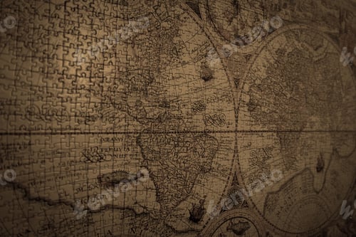 Preview: Closeup shot of a vintage world map made with puzzles