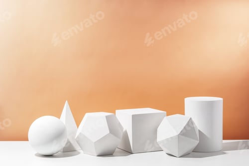 Preview: Various geometric shapes arranged artistically on a table with a warm, soft background during