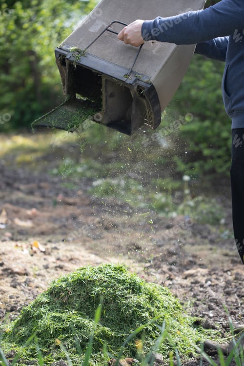 Preview: Composting of cut grass and fallen leaves to enrich soil