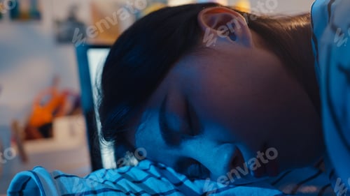 Preview: Freelance Asia exhausted lady hard work sleeping at new normal home office.