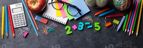 Preview: Supplies and apple over chalk board