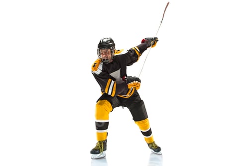 Preview: one caucasian man hockey player in studio silhouette isolated on white background