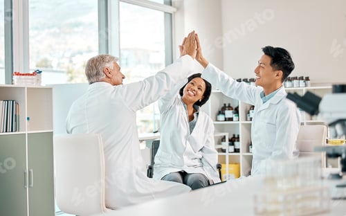 Preview: Shot of a group of scientists giving each other a high five in a lab