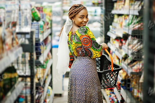 Preview: Afro black women costumer at the market.