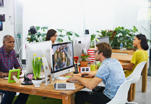 Preview: Bringing ideas into focus. Shot of a young designers at work in an office.