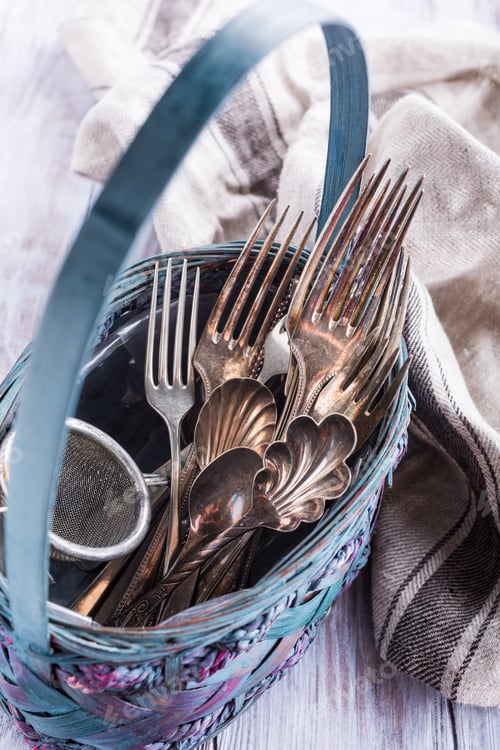 Preview: Vintage cutlery in old blue wicker basket