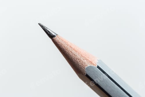 Preview: Sharp pencil rests on a light surface ready for writing or drawing new ideas