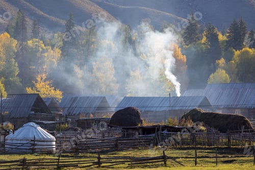 Preview: xinjiang baihaba villages in the morning, somke is spiralling upward from kitchens chimneys