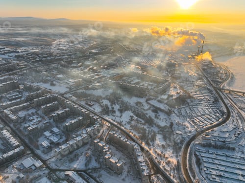 Preview: Murmansk city with industrial elements at sunset