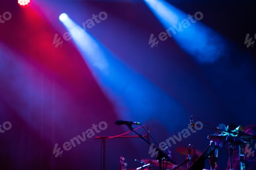Preview: Colorful stage lights and microphone at concert