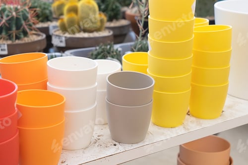 Preview: Gardening shop stands with colorful flower pots. Preparation home gardening concept